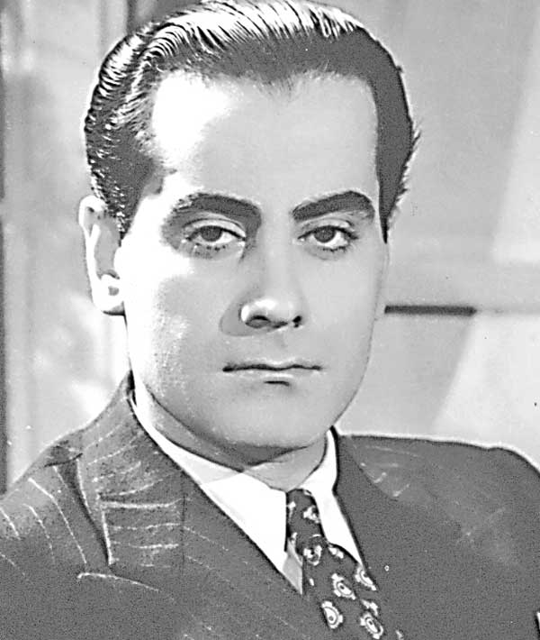 فريد الأطرش في صورة بورتريه مع العود.